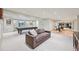 Spacious basement with a pool table, sitting area, and gym at 5528 S Jasper Way, Centennial, CO 80015