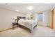 Comfortable bedroom with natural light and closet at 5528 S Jasper Way, Centennial, CO 80015