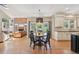 Charming dining area connected to both the living room and kitchen at 5528 S Jasper Way, Centennial, CO 80015