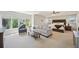 Spacious main bedroom retreat with sitting area, large windows, and tray ceilings at 5528 S Jasper Way, Centennial, CO 80015