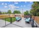 Relaxing backyard deck with comfortable seating, perfect for outdoor entertaining and leisure at 2664 Forest St, Denver, CO 80207