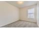 This bedroom features neutral walls, carpet and a bright window allowing natural light to fill the room at 20344 Heather Ln, Parker, CO 80138