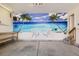 Garage with an ocean-themed mural, creating a relaxing atmosphere with ample space at 20344 Heather Ln, Parker, CO 80138