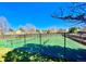 Well-maintained tennis courts surrounded by lush greenery, providing residents with an active lifestyle option at 20344 Heather Ln, Parker, CO 80138
