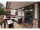 Comfortable balcony with seating, a small table, and views of the community at 2700 S Holly St # 202, Denver, CO 80222