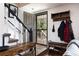Charming entryway with coat rack and a bench for shoes at 2700 S Holly St # 202, Denver, CO 80222