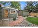 Private backyard with a quaint studio, storage shed, and attractive landscaping at 632 Wyoming St, Golden, CO 80403