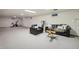 Spacious finished basement area with comfortable seating and exercise equipment at 632 Wyoming St, Golden, CO 80403
