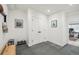 Inviting entryway with tile floors, artwork, and a view to the office at 632 Wyoming St, Golden, CO 80403