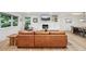 Bright living room features a stone fireplace, hardwood floors, and modern decor at 632 Wyoming St, Golden, CO 80403
