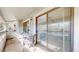 Covered balcony showing patio furniture and sliding glass doors at 14495 E 1St Dr # C1, Aurora, CO 80011