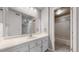 Bathroom featuring a single sink vanity and a shower over tub at 14495 E 1St Dr # C1, Aurora, CO 80011