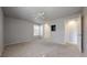 This spacious bedroom features a ceiling fan, neutral carpet, and ample closet space at 14495 E 1St Dr # C1, Aurora, CO 80011