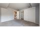 This bedroom has neutral carpet, ample closet space, and a laundry area at 14495 E 1St Dr # C1, Aurora, CO 80011