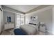 This spacious main bedroom features a private balcony and neutral decor at 14495 E 1St Dr # C1, Aurora, CO 80011
