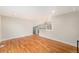 Spacious living room with hardwood floors, offering a seamless transition to other spaces at 15908 E Flora Pl, Aurora, CO 80013