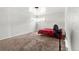 Spacious bedroom with carpet floors, a ceiling fan, and a window at 5942 Poplar St, Commerce City, CO 80022