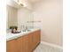 Bathroom vanity with a decorative tiled countertop and backsplash, adding style to the space at 295 Jersey St, Denver, CO 80220
