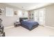 Cozy bedroom with natural light and neutral decor at 295 Jersey St, Denver, CO 80220