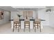 Basement bar area with seating and lighting at 9161 W Lake Dr, Littleton, CO 80123