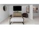 Cozy living room featuring stylish decor, contemporary art, comfortable seating, and a serene, inviting atmosphere at 9161 W Lake Dr, Littleton, CO 80123