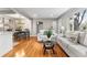 Bright living room features hardwood floors, modern sofas, and decorative accents at 4625 Webster St, Wheat Ridge, CO 80033