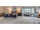 Open main bedroom with an oversized sitting area and large picture window for ample natural light at 8927 Green Meadows Ln, Highlands Ranch, CO 80126