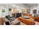 Open-concept living space featuring kitchen, dining area, and comfortable seating at 865 Delaware St, Denver, CO 80204