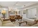 Bright living room featuring stylish furniture and a large window with serene views at 865 Delaware St, Denver, CO 80204
