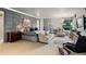 Spacious main bedroom features a sitting area, modern design, and large window for natural light at 865 Delaware St, Denver, CO 80204
