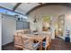 Cozy outdoor dining area with a wooden table and seating for six at 865 Delaware St, Denver, CO 80204