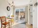 Bright dining area with a view of the patio, perfect for enjoying meals with Gathering and friends at 5959 S Willow Way, Greenwood Village, CO 80111