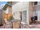 Outdoor patio perfect for dining or grilling with a table and grill available for use at 5959 S Willow Way, Greenwood Village, CO 80111