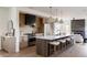 Stylish kitchen with stainless steel appliances, white countertops, and a central island with barstool seating at 3437 W 17Th Ave, Denver, CO 80204