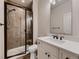 Elegant bathroom featuring a tiled shower, modern vanity, and updated fixtures at 5441 Twilight Way, Parker, CO 80134