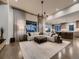 Spacious living room with large windows and open floor plan at 5441 Twilight Way, Parker, CO 80134