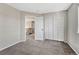 Comfortable bedroom with neutral tones, carpet, and closet space at 11730 Crow Hill Dr, Parker, CO 80134