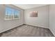 Bright bedroom with large window offering natural light and pleasant views at 11730 Crow Hill Dr, Parker, CO 80134