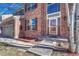 Inviting front entrance showcasing the brick facade, well-maintained walkway, and an attached garage at 11730 Crow Hill Dr, Parker, CO 80134