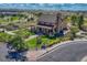 Stunning exterior view of a charming building with manicured landscaping and inviting outdoor seating at 12187 S Hidden Trail Ct, Parker, CO 80138