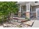 Landscaped front yard with stone steps leading to the front porch at 12187 S Hidden Trail Ct, Parker, CO 80138