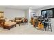 Basement living room is a great area to unwind with music and comfortable furniture at 12187 S Hidden Trail Ct, Parker, CO 80138