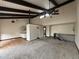 Spacious living room with high vaulted ceilings and exposed wood beams at 1943 Meadow Dr # B2, Longmont, CO 80501