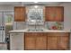 Bright kitchen features stainless steel appliances, plenty of counter space, and natural light at 4694 S Ouray Way, Aurora, CO 80015