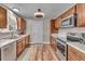 Modern kitchen features stainless steel appliances, sleek countertops, and ample cabinet space at 4694 S Ouray Way, Aurora, CO 80015