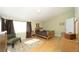 Bright bedroom with natural light, hardwood floors, and cozy decor at 15300 Cavanaugh Rd, Keenesburg, CO 80643
