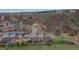 Aerial view of townhome in a community near a hill, indicated by a red marker at 1552 Live Oak Rd, Castle Rock, CO 80104