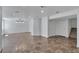 Spacious finished basement with tile floors, recessed lighting, and staircase to upper floor at 1552 Live Oak Rd, Castle Rock, CO 80104
