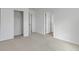 A well-lit bedroom with plush neutral carpeting and closet space at 1552 Live Oak Rd, Castle Rock, CO 80104