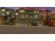 Charming townhome with attached garages, front decks, and lush landscaping at 1552 Live Oak Rd, Castle Rock, CO 80104